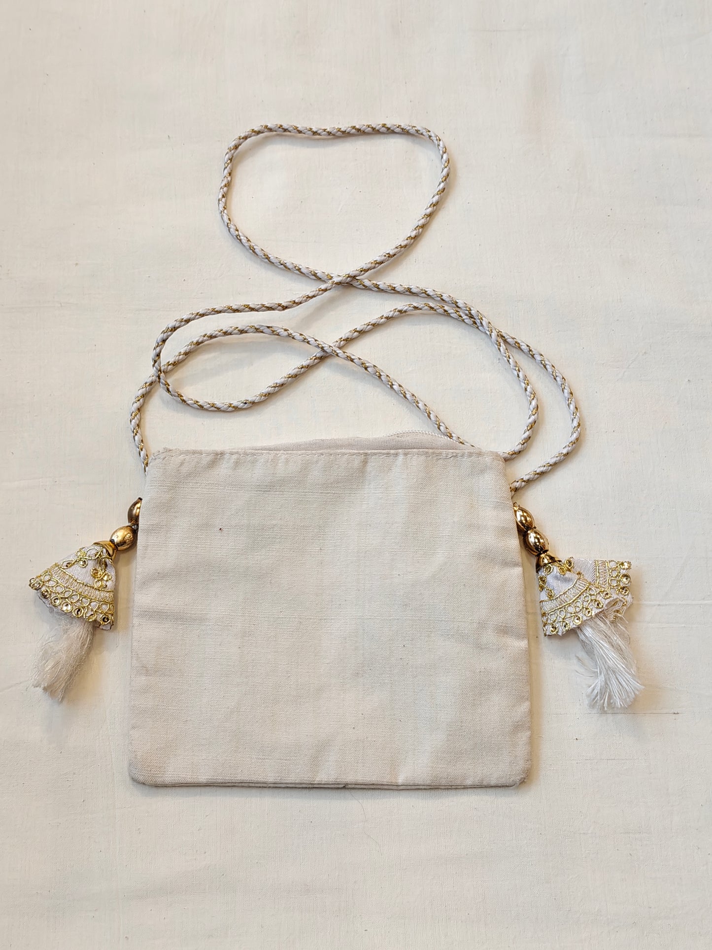 Handpainted on off white base fabric pouch with zipper closure, Tassles and sling - multiple designs available