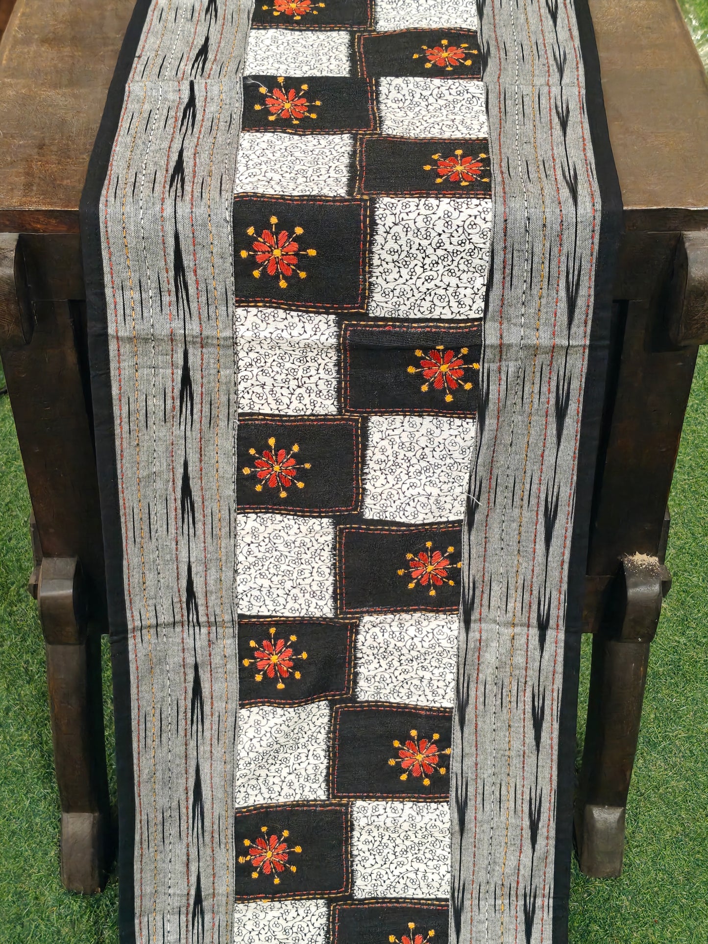 White, grey n black table runner - hand woven ikat with hand embroidered floral motifs