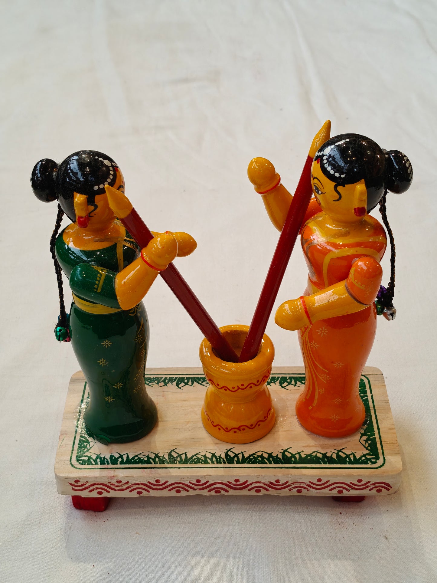 Two women pounding - handcrafted wooden decor