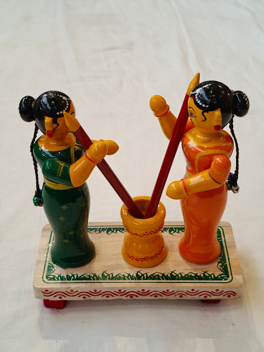 Two women pounding - handcrafted wooden decor