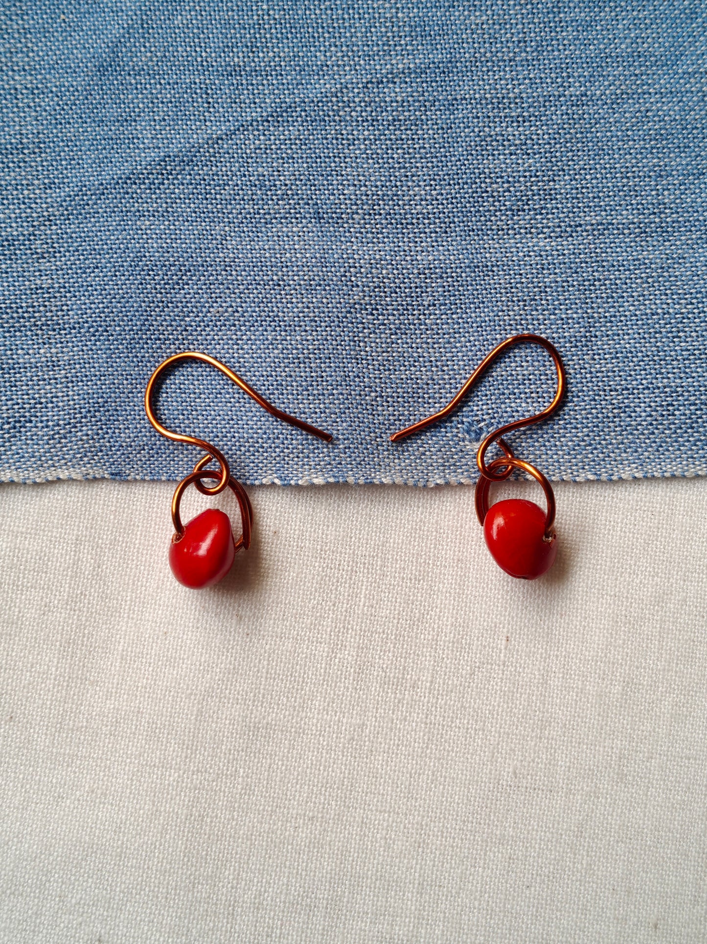 Handcrafted earrings designed with seed