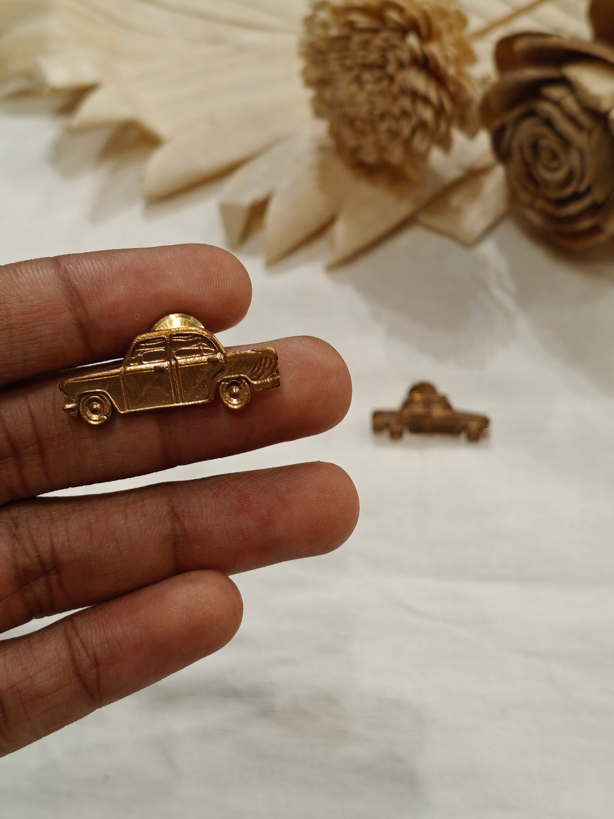 Car shaped brass stud earrings