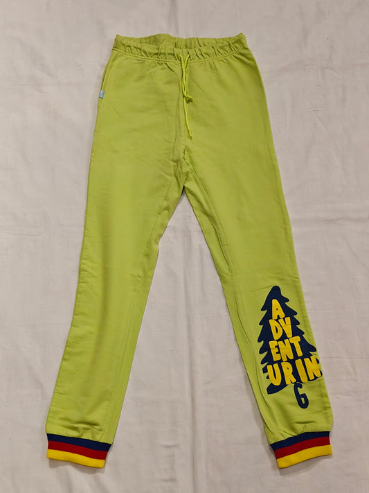 Lime cotton jogger pants with Adventure print for collared
