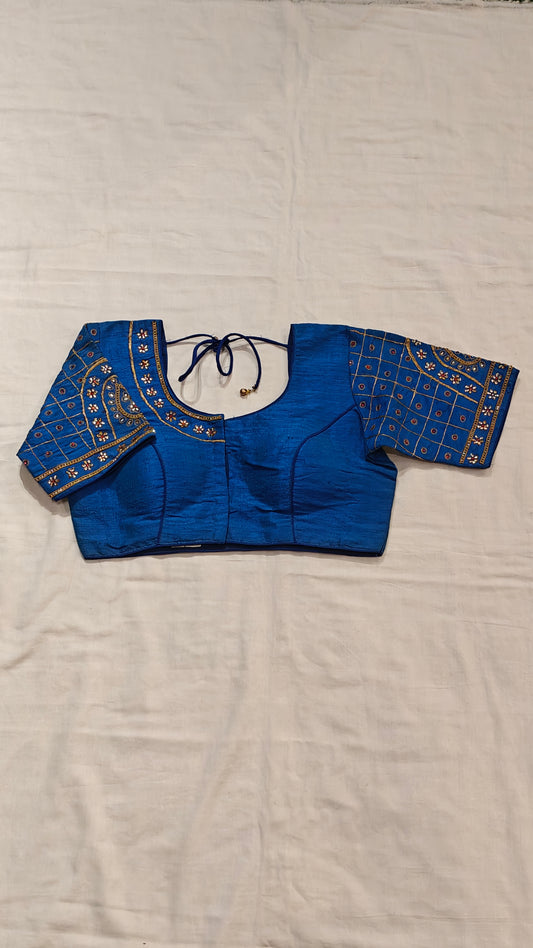 Blue blouse with golden embroidery and stonework on sleeves and half neck - elbow sleeved, front open