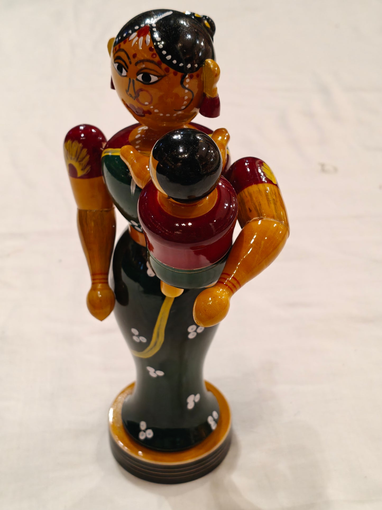 Mother carrying her baby - handcrafted wooden decor