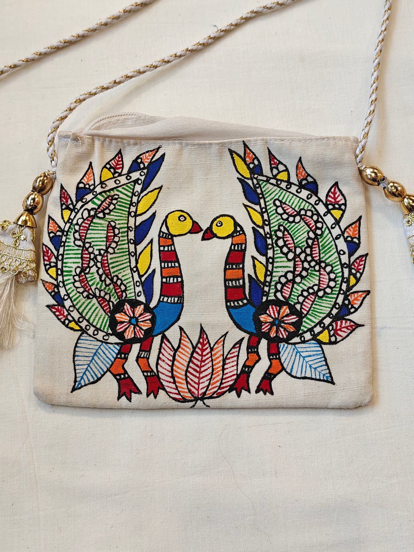 Handpainted on off white base fabric pouch with zipper closure, Tassles and sling - multiple designs available