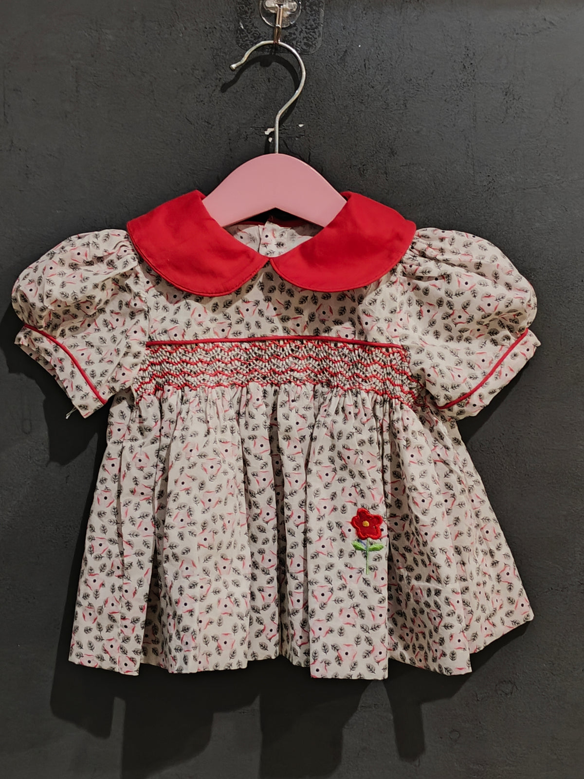 White n grey floral printed smocking frock with red peter pan collar