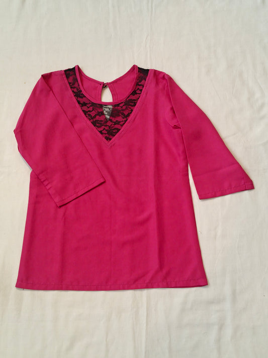 Pink top with black net neck