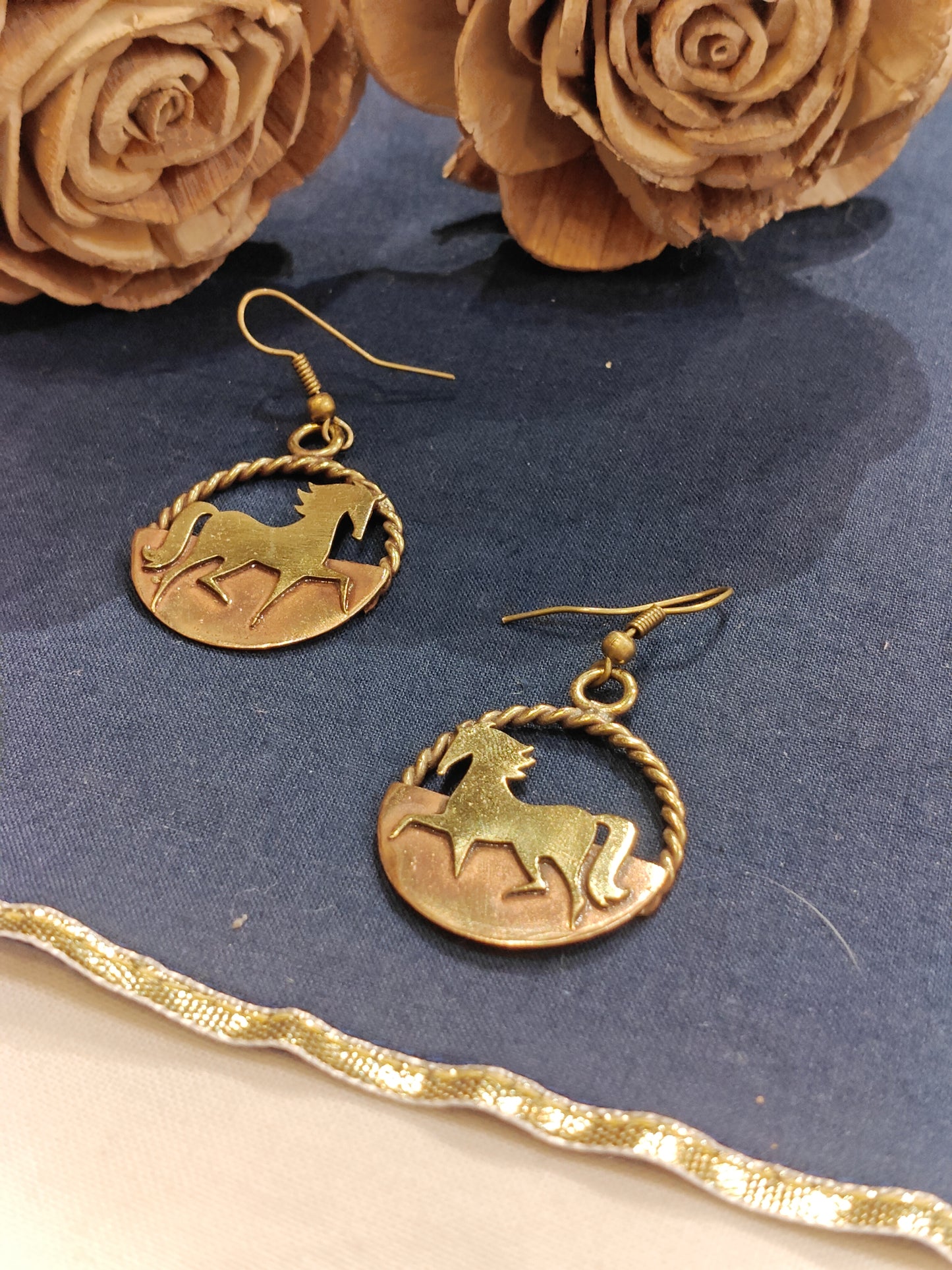 Prancing horse in a circle - handcrafted hooks earrings in copper and brass