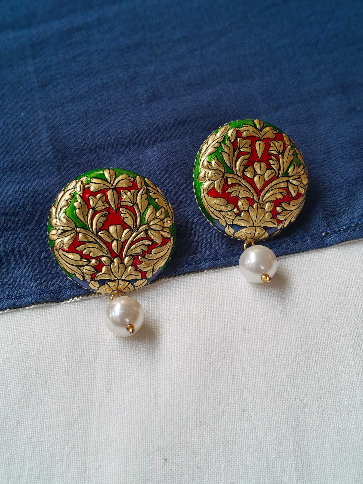 Gold embossed round with pearl stud earrings