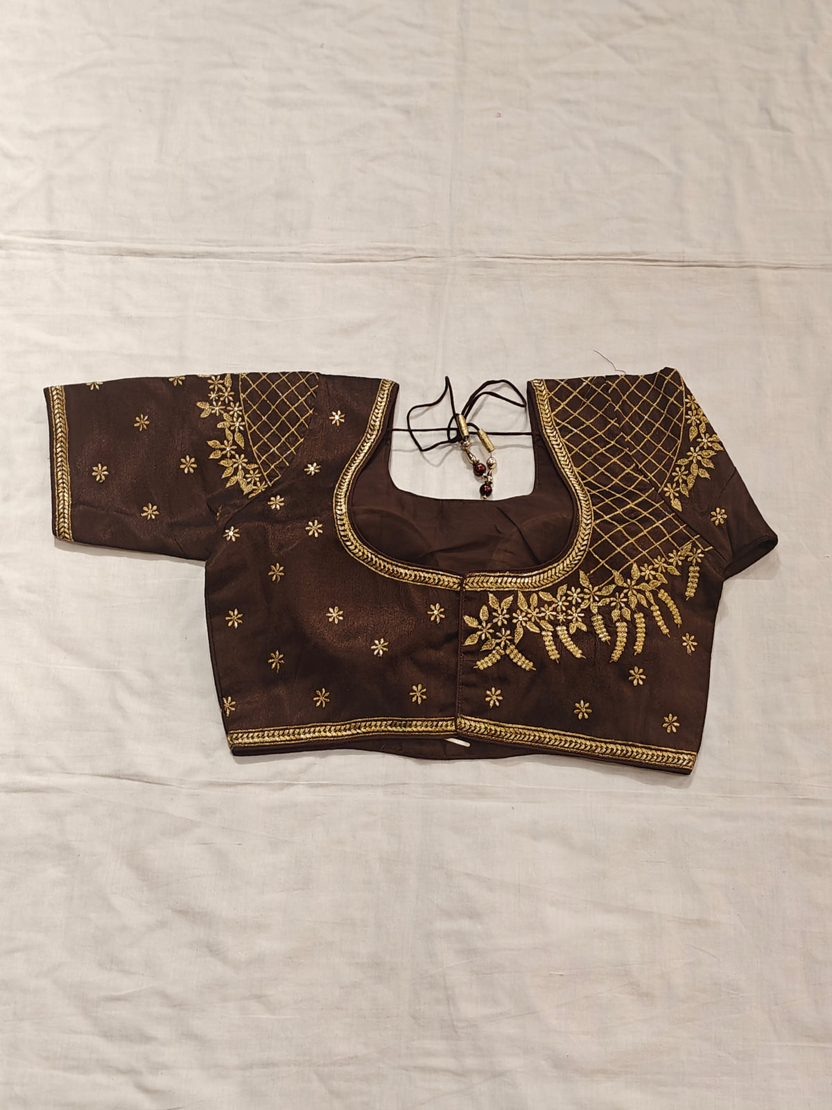 Saree blouse with gold zari embroidery and floral motifs - click to see colors