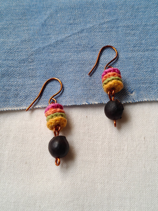 Handcrafted earrings with seeds and crochet flowers