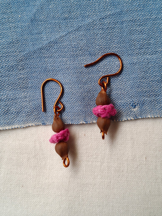 Handcrafted earrings designed with seed