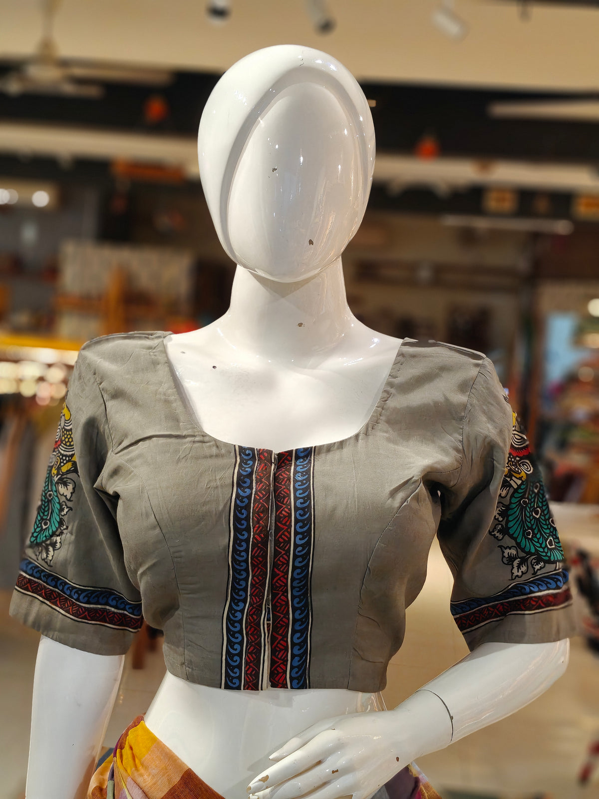 Grey with peacocks on sleeves n back hand-painted Pen Kalamkari silk blouse