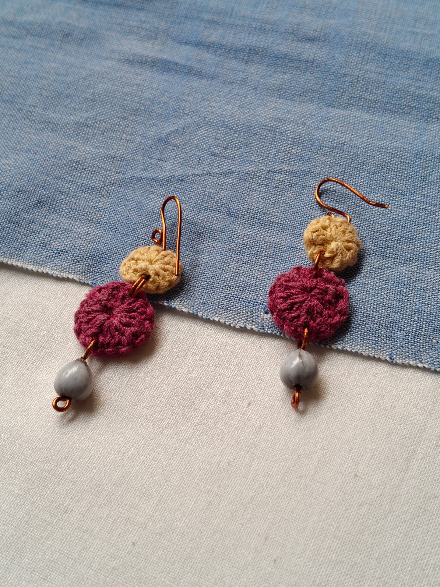 Handcrafted seed earrings with copper hooks