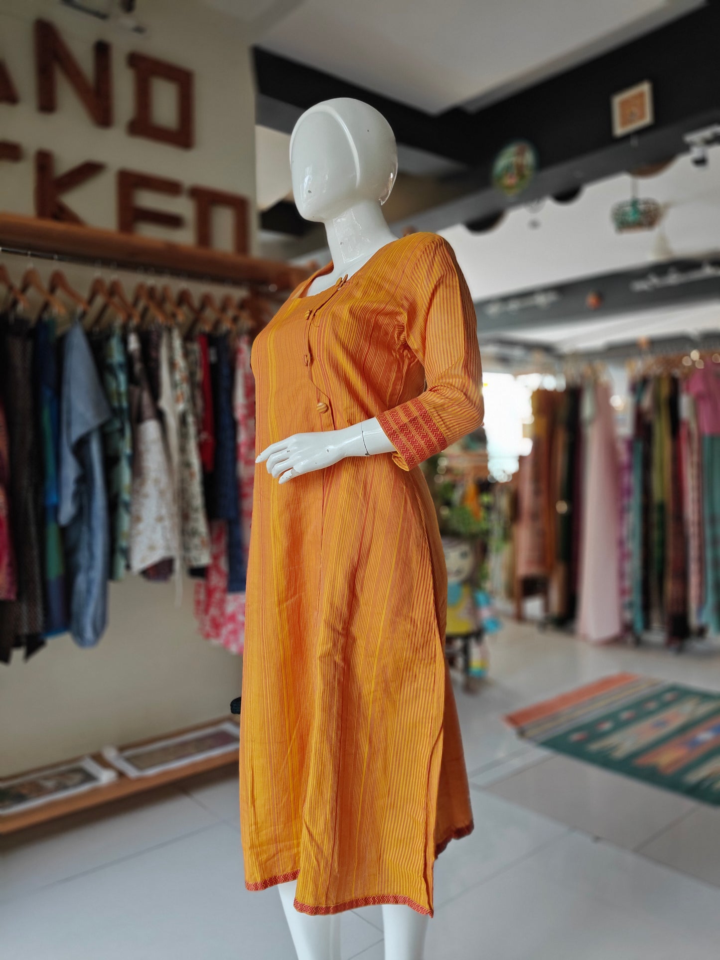 Orange and yellow striped Maheshwari handwoven cotton dress