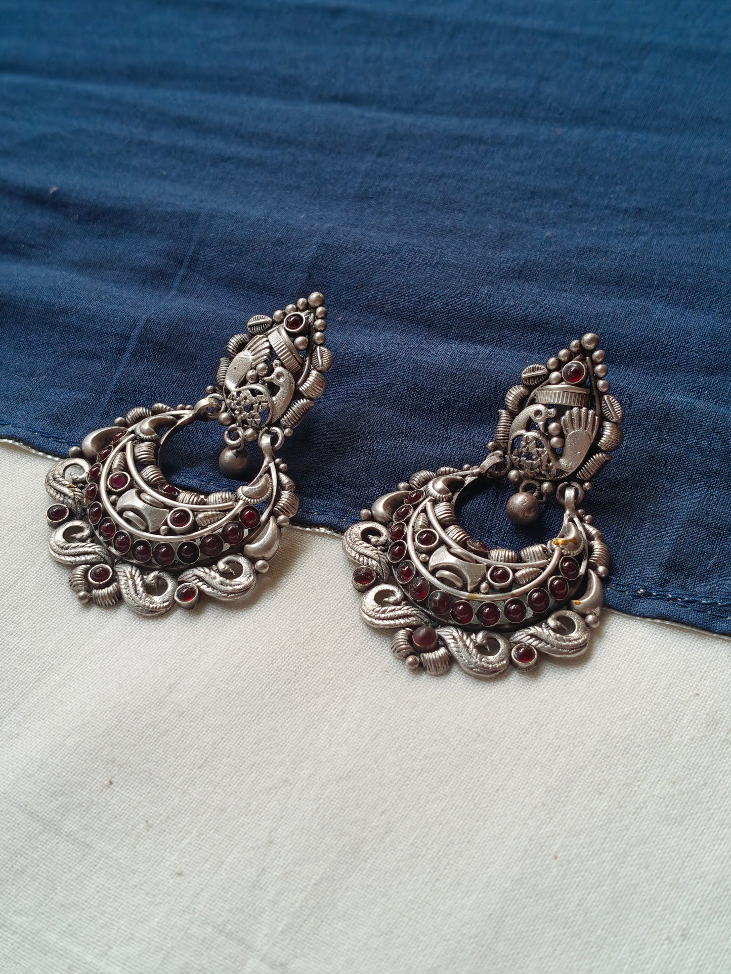 Peacock with red stones stud earrings in 92.5 sterling silver