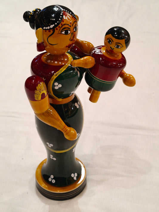 Mother carrying her baby - handcrafted wooden decor
