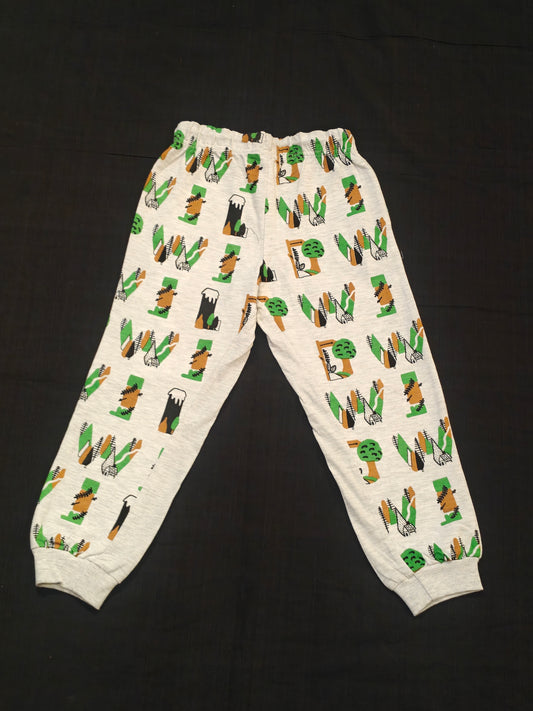 Light grey track pants for kids with forest prints