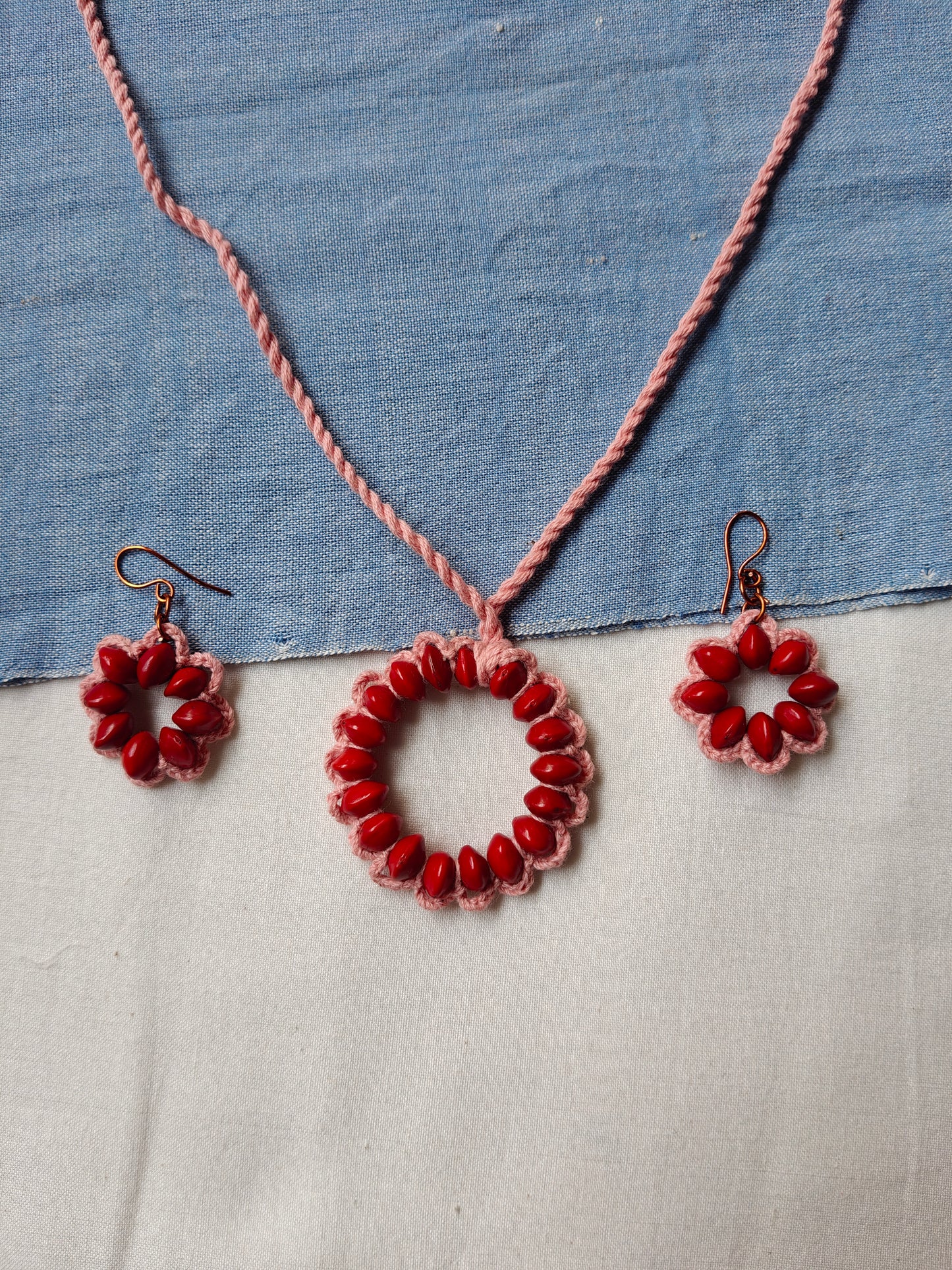 Red Circle seeds in pink yarn Neck piece and earrings set