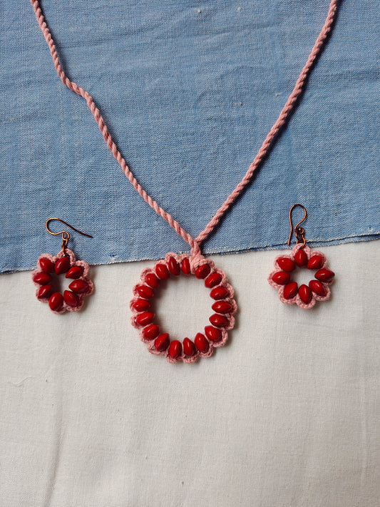 Red Circle seeds in pink yarn Neck piece and earrings set