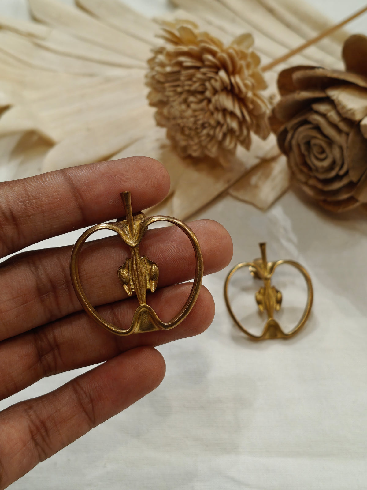 Apple shaped brass stud earrings