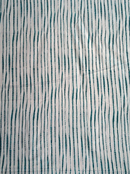 Green and white wavy stripes pattern fabric