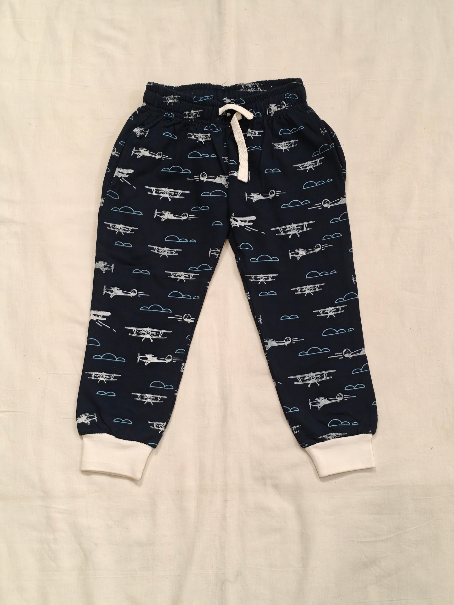 Navy blue cotton jogger pants with Aircrafts print for children