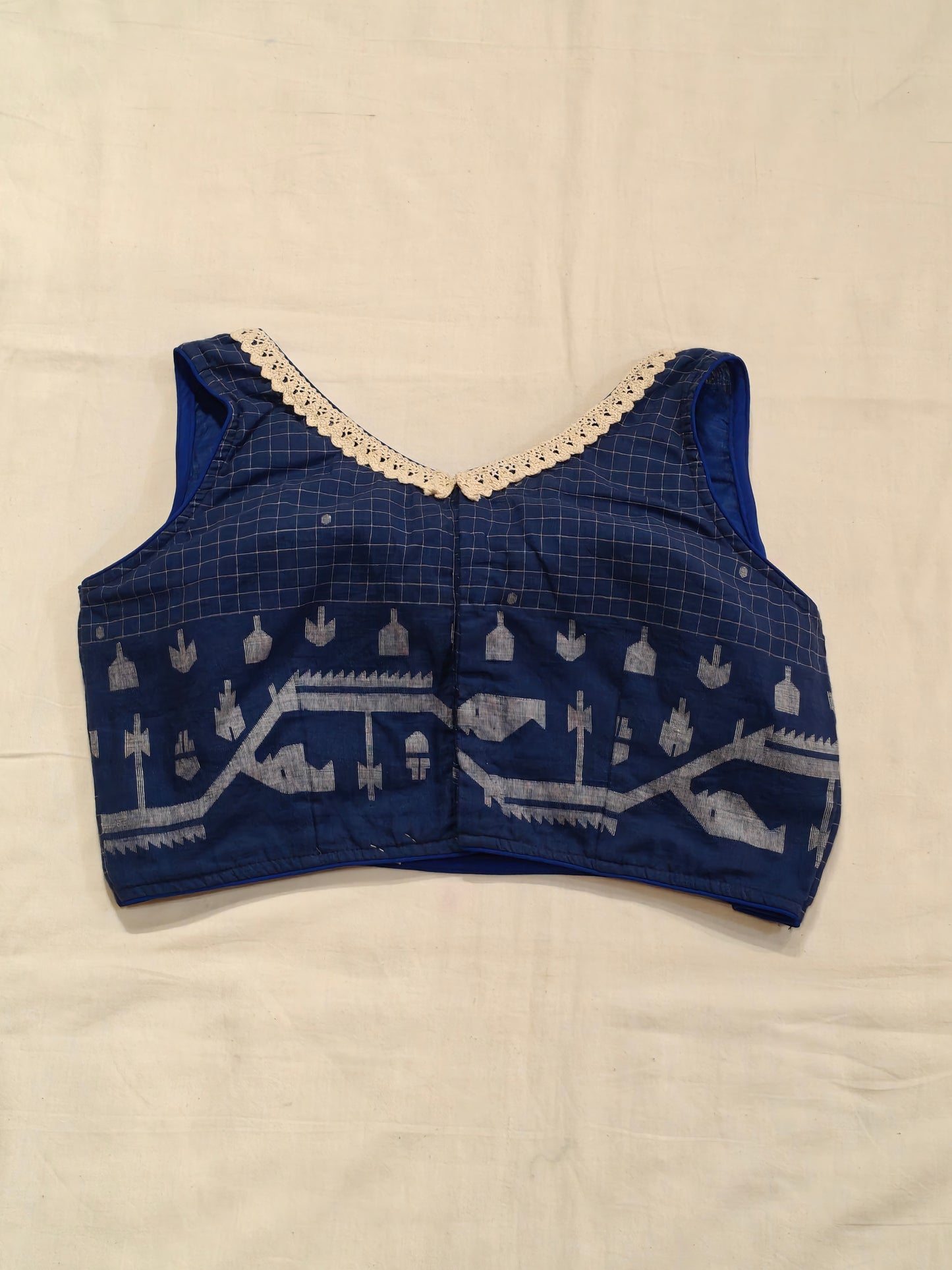Blue Jamdani handloom cotton checkered sleeveless blouse with lace trims