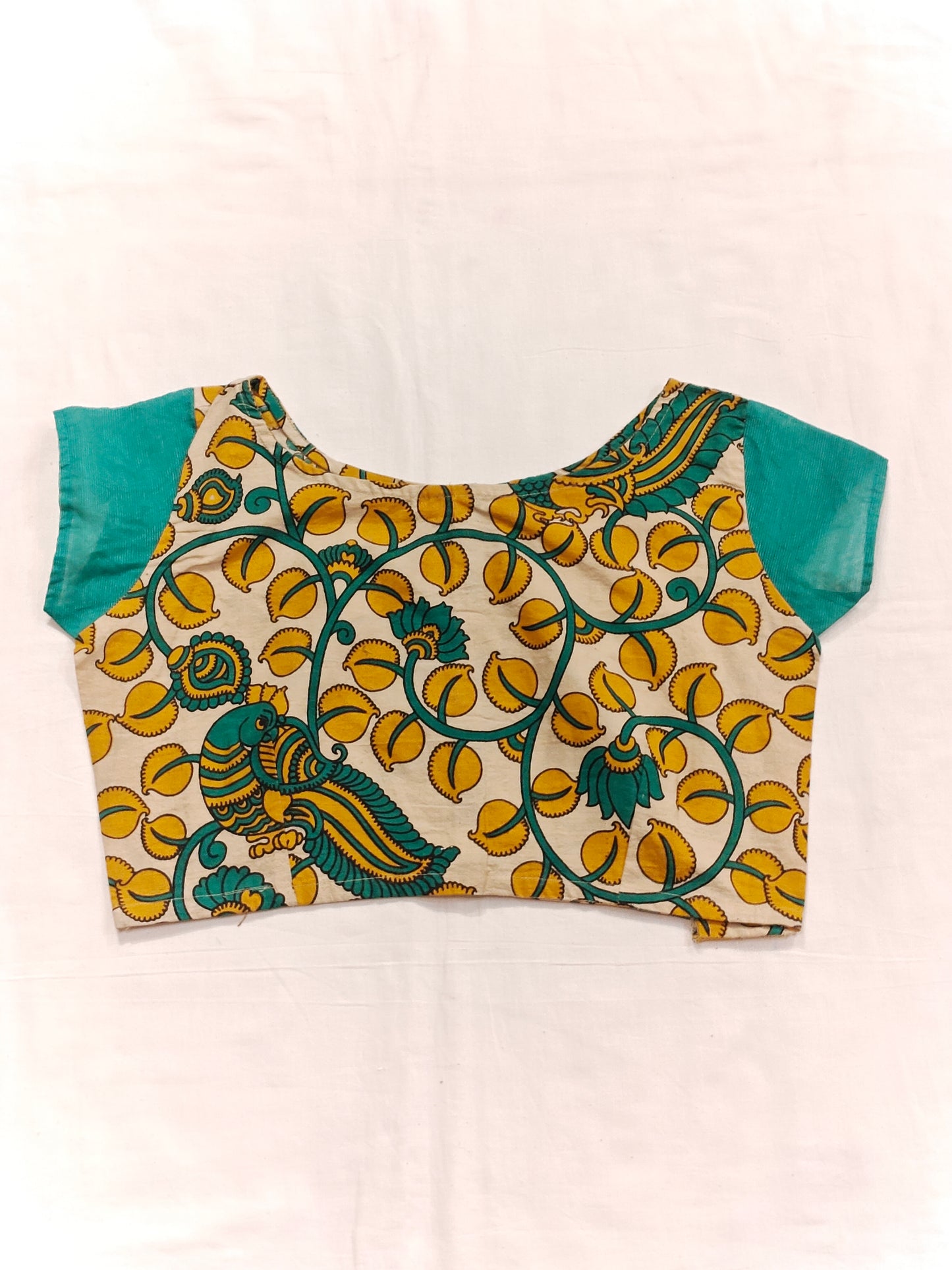 Beige printed cotton blouse with green short sleeves