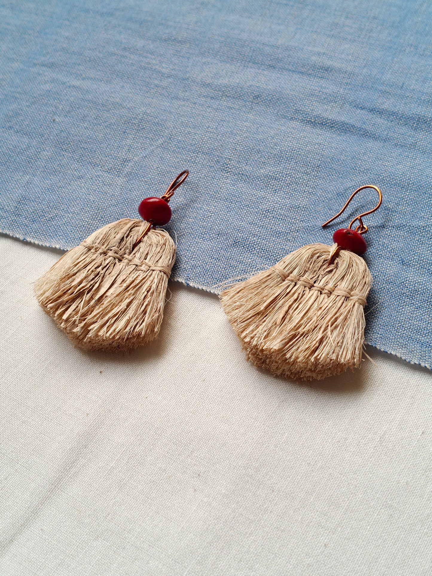 Handcrafted seed earrings with copper hooks