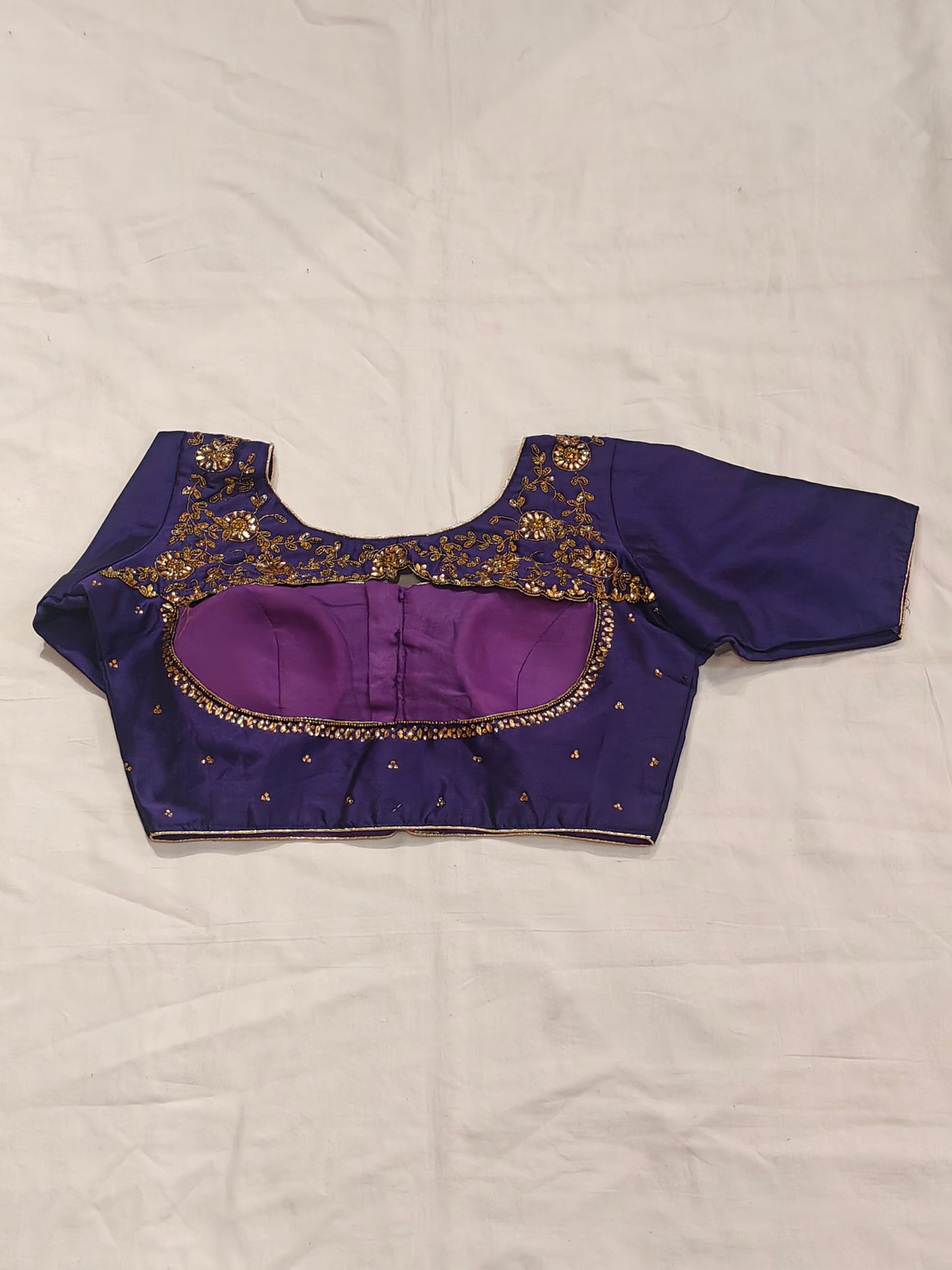 Art silk blouse with stone work and hand embroidery on back