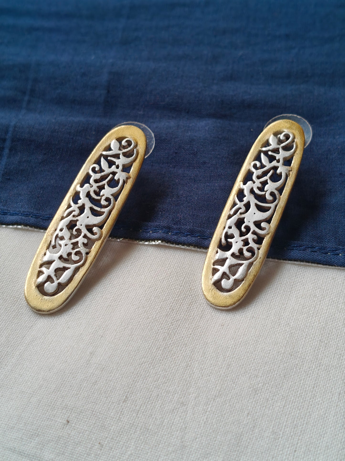 Oval shaped silver and gold dual tone stud earrings - 92.5 Sterling silver