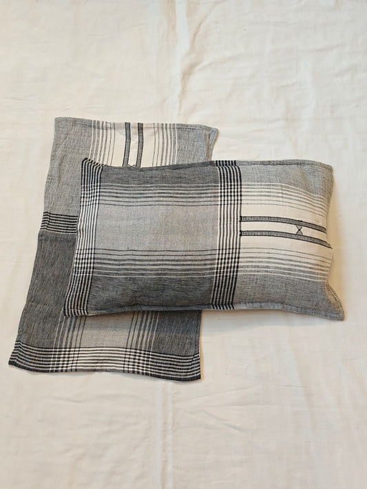 Handwoven black n white pillow cover featuring striped patterns