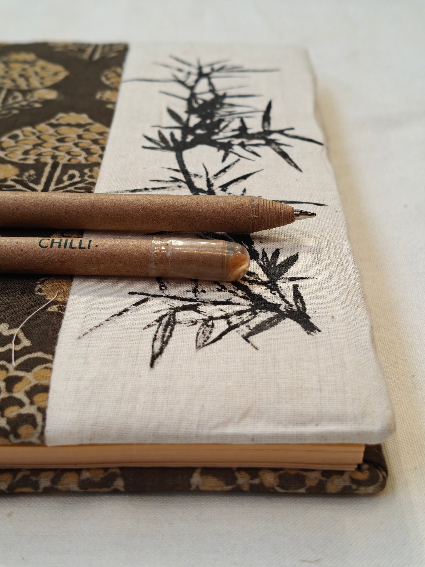 Handcrafted plantable pen with seeds at the bottom