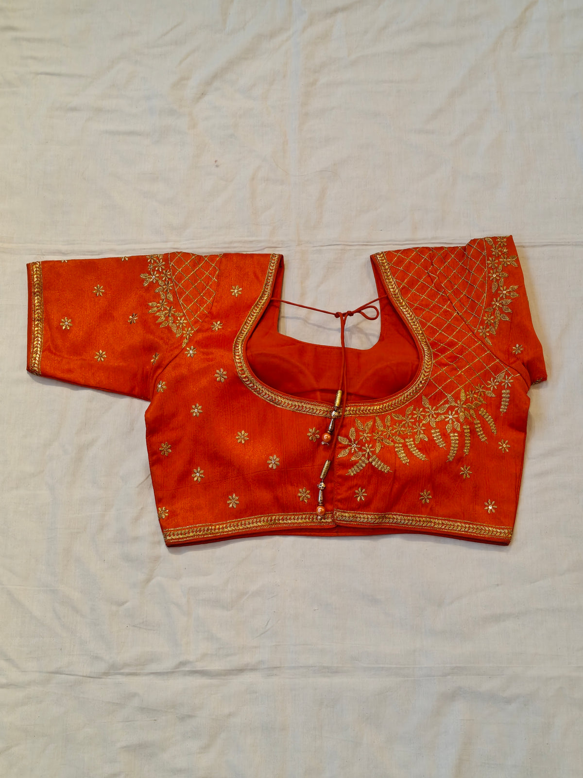 Saree blouse with gold zari embroidery and floral motifs - click to see colors