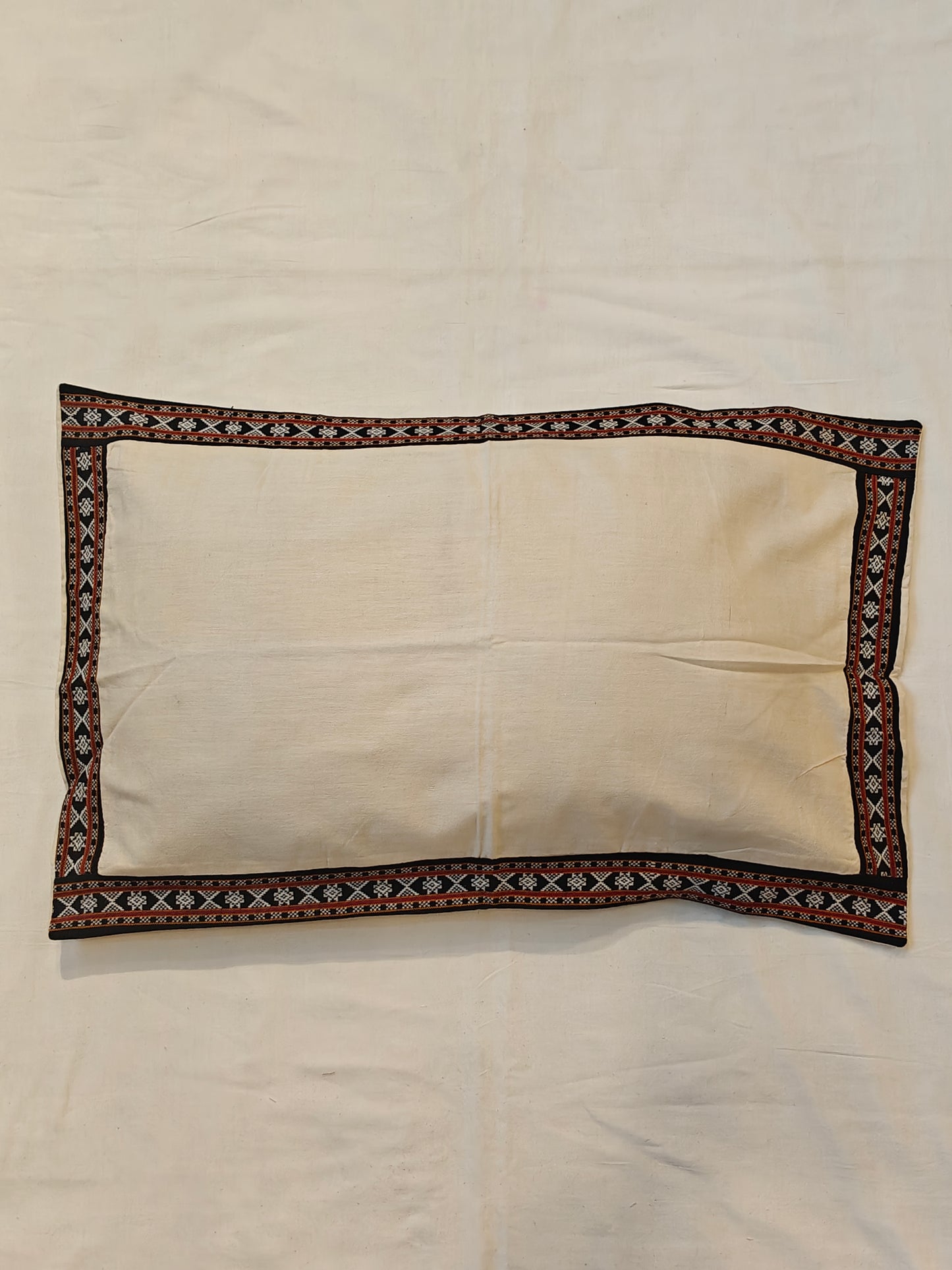 Off-white handcrafted cotton pillow cover with borders