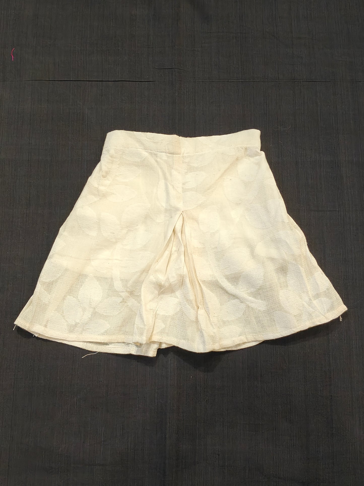Off white cutwork handloom cotton skirt with leaves pattern