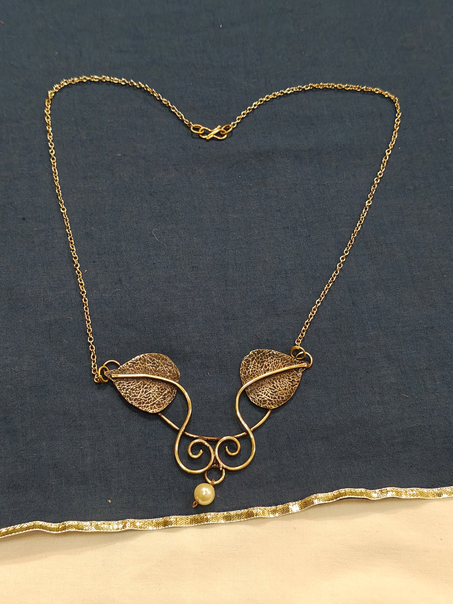 Two leaves with a pearl drop chain necklace - handcrafted in copper and brass