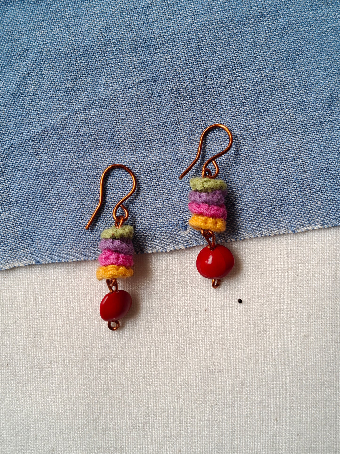 Handcrafted earrings with seeds and crochet flowers