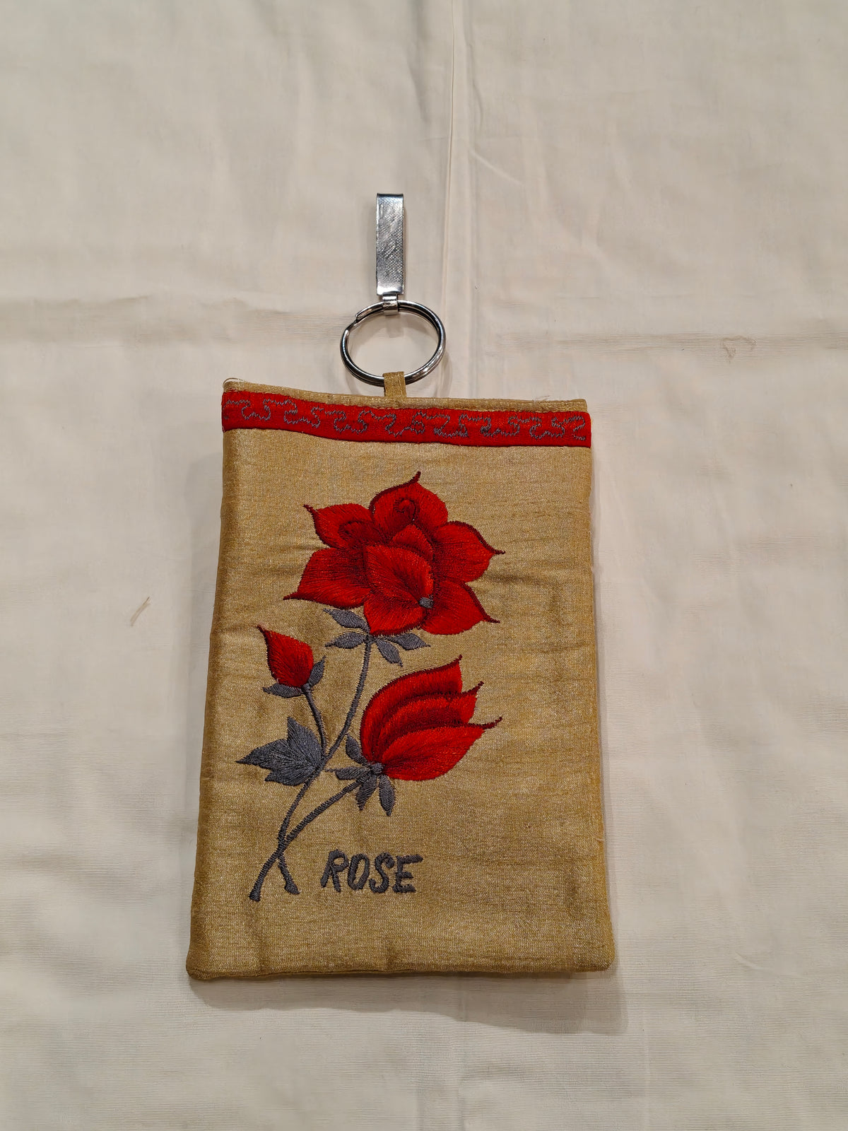 Silk embroidered phone pouches with waist clip on and a sling - multiple options available