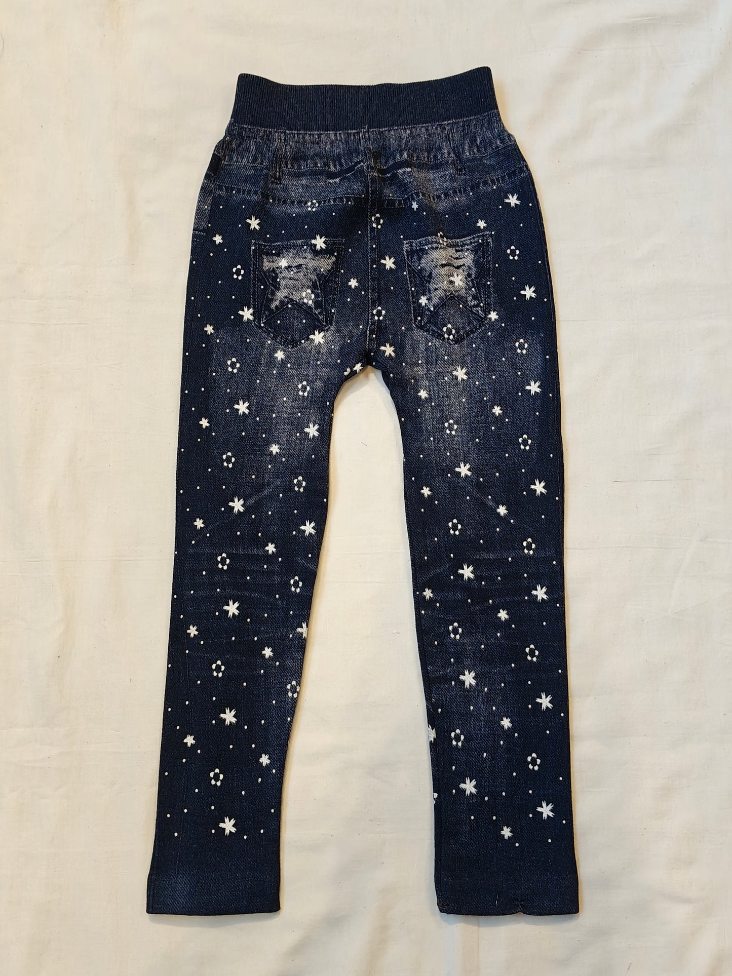Blue denim style jeggings for children with flowers prints