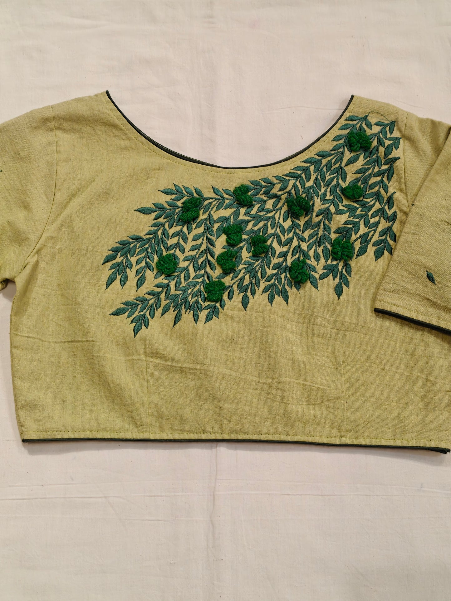 Light green cotton half sleeves blouse with green leaf embroidery back