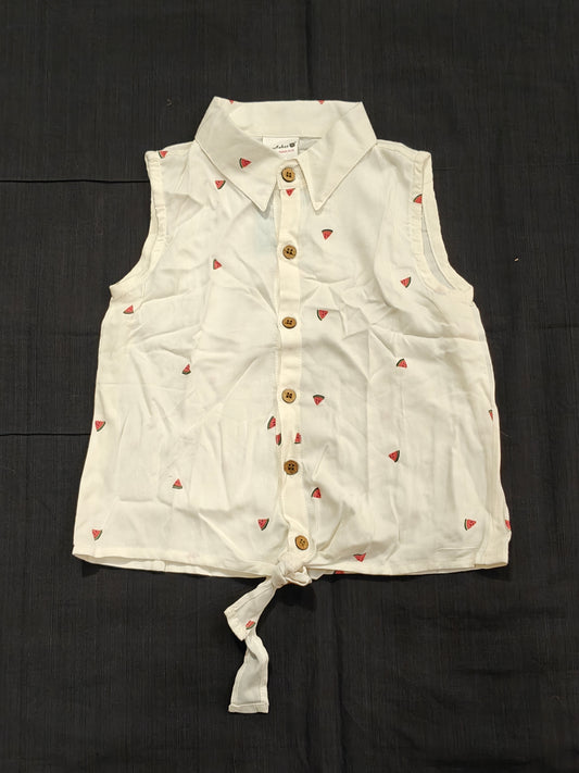 White sleeveless top with watermelon prints and button down tie up hem
