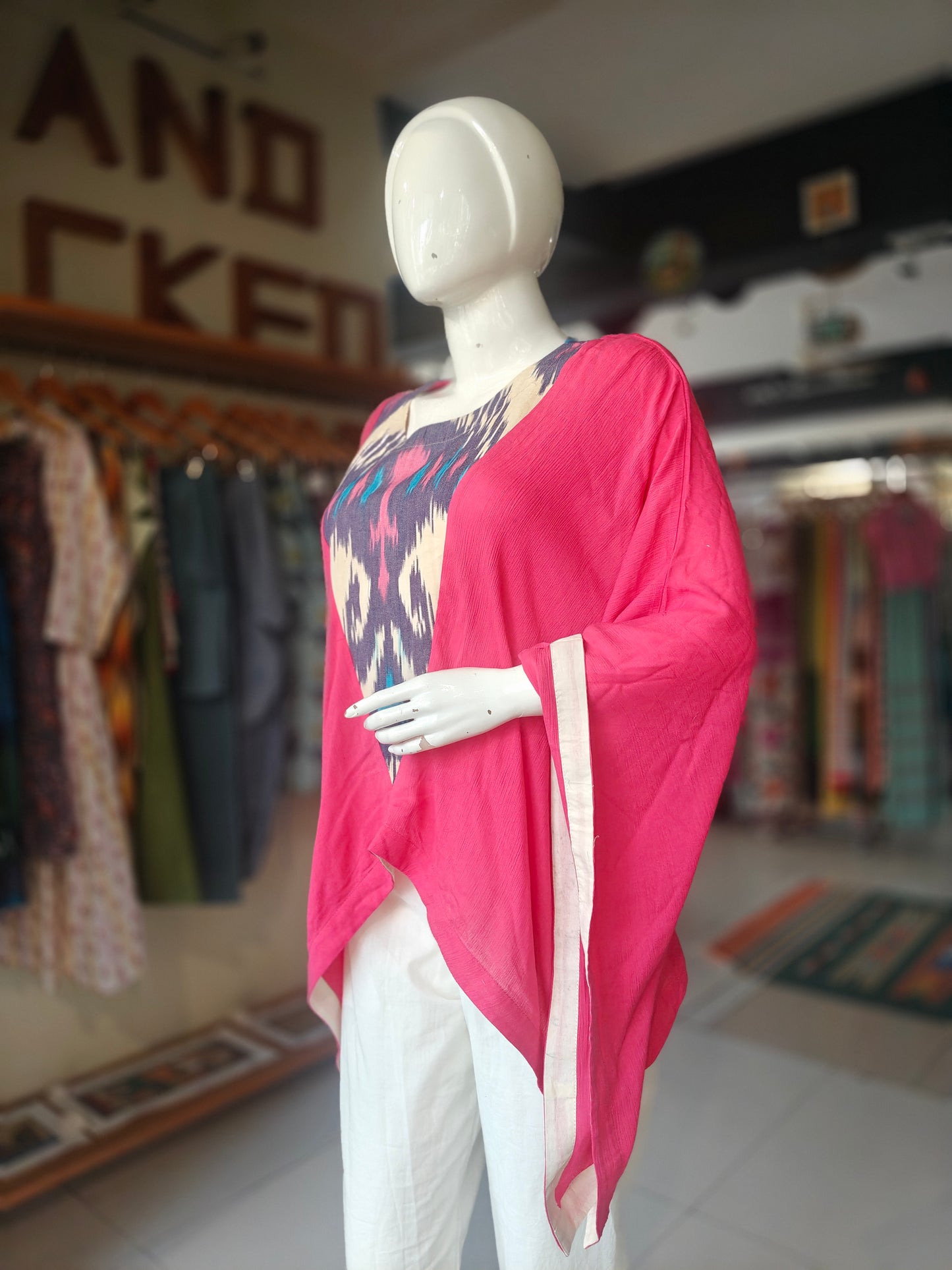 Pink kaftan top with ikat patterned panel