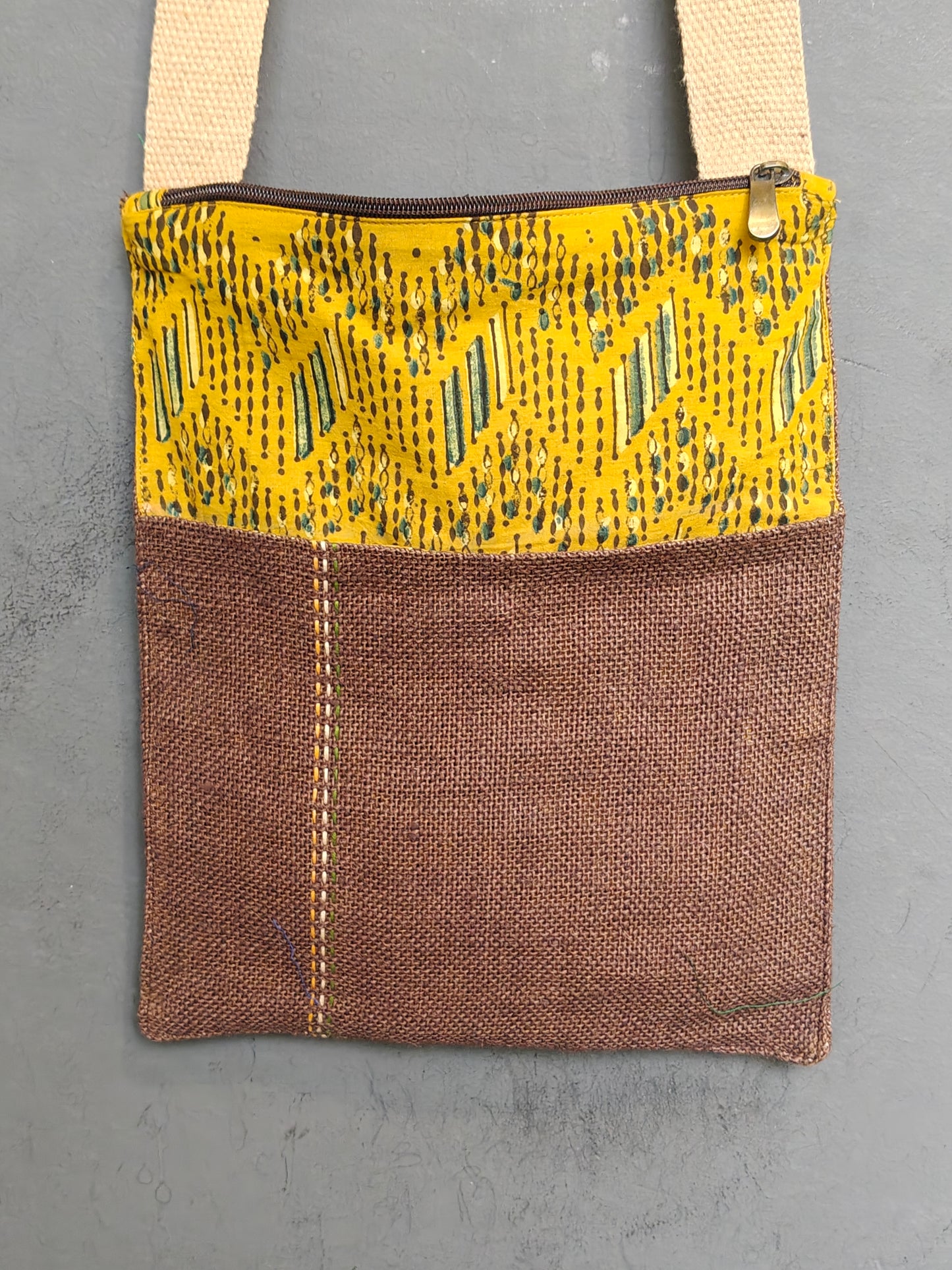 Handmade crossbody sling bag with multicolour fabric panels and jute
