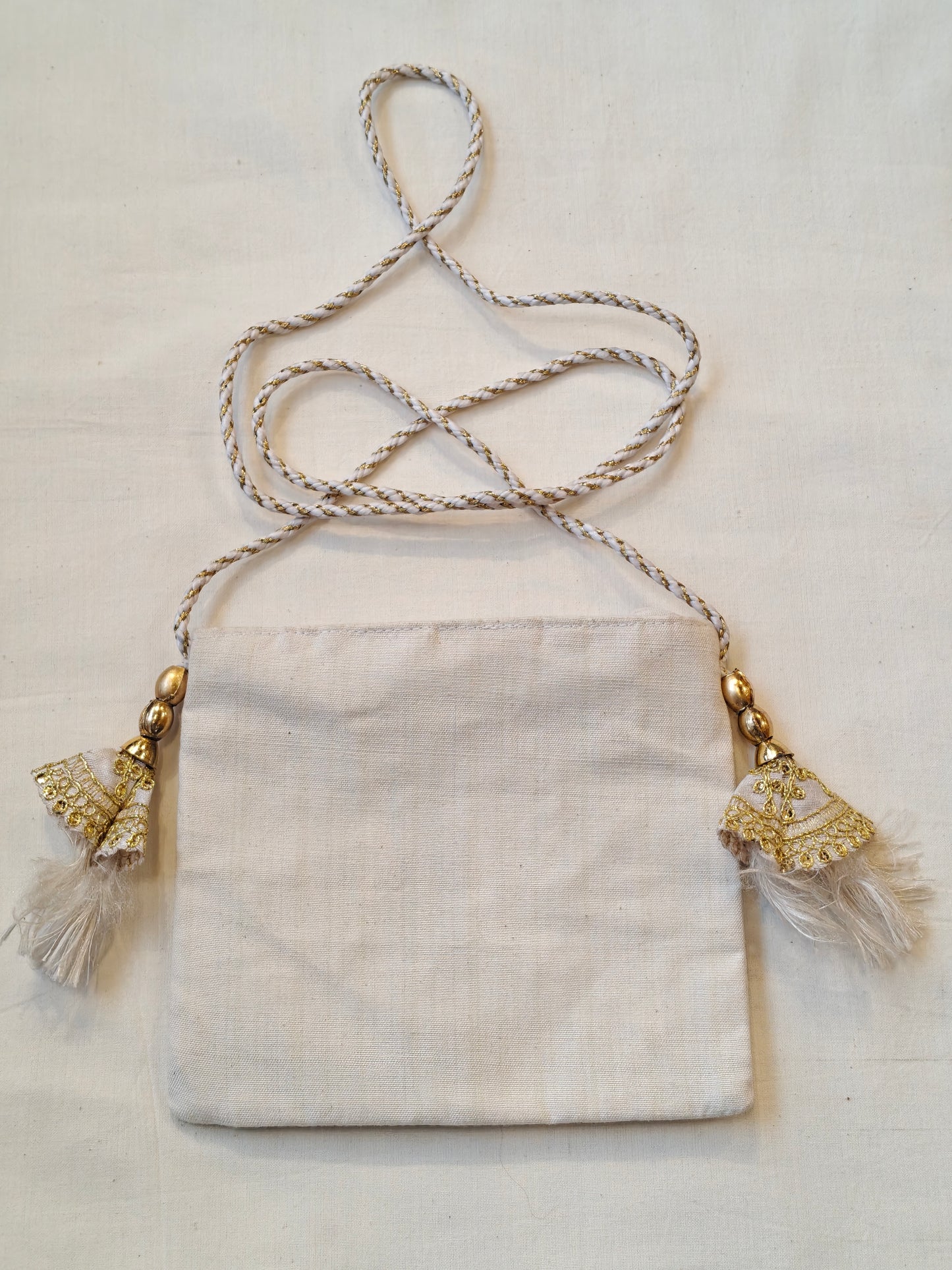 Handpainted on off white base fabric pouch with zipper closure, Tassles and sling - multiple designs available