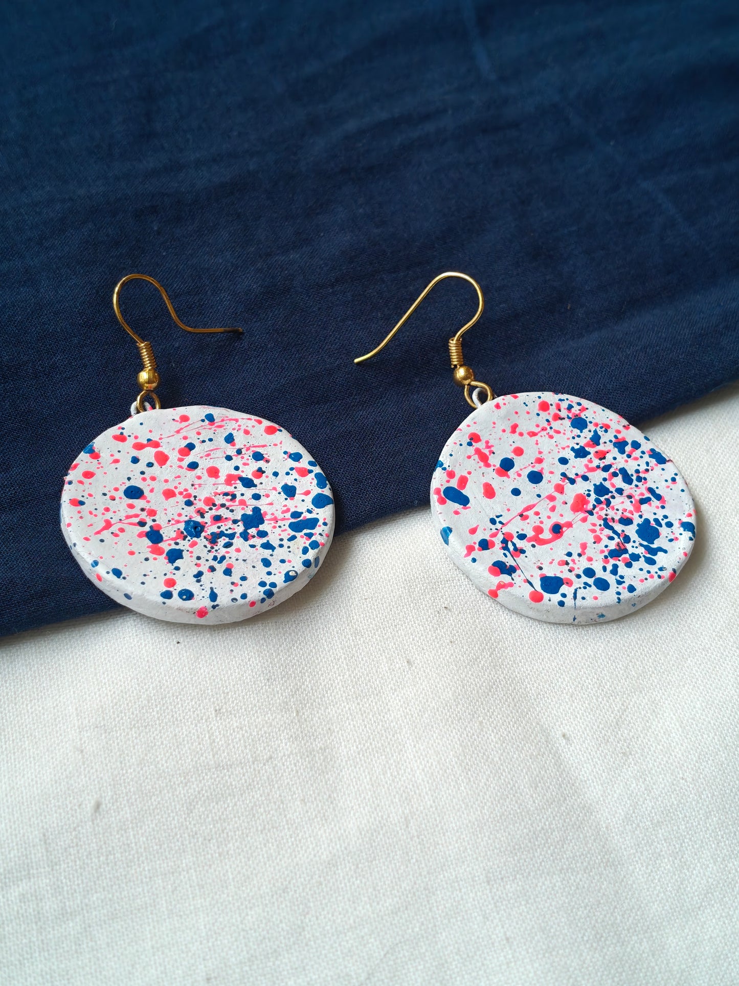 Round color splattered handcrafted, handpainted terracotta hook earrings