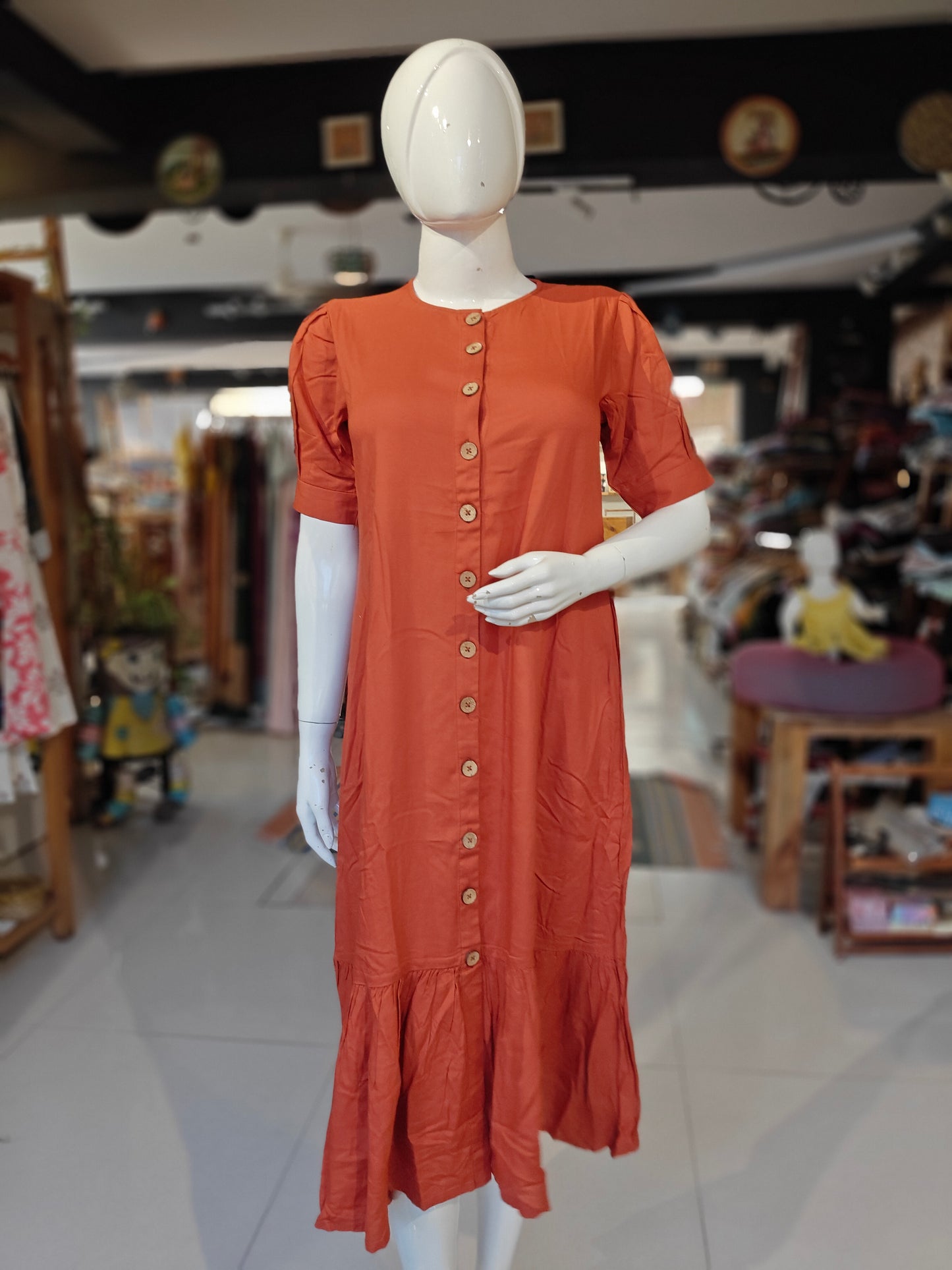 Plain rust orange button down rayon dress with frills at hem