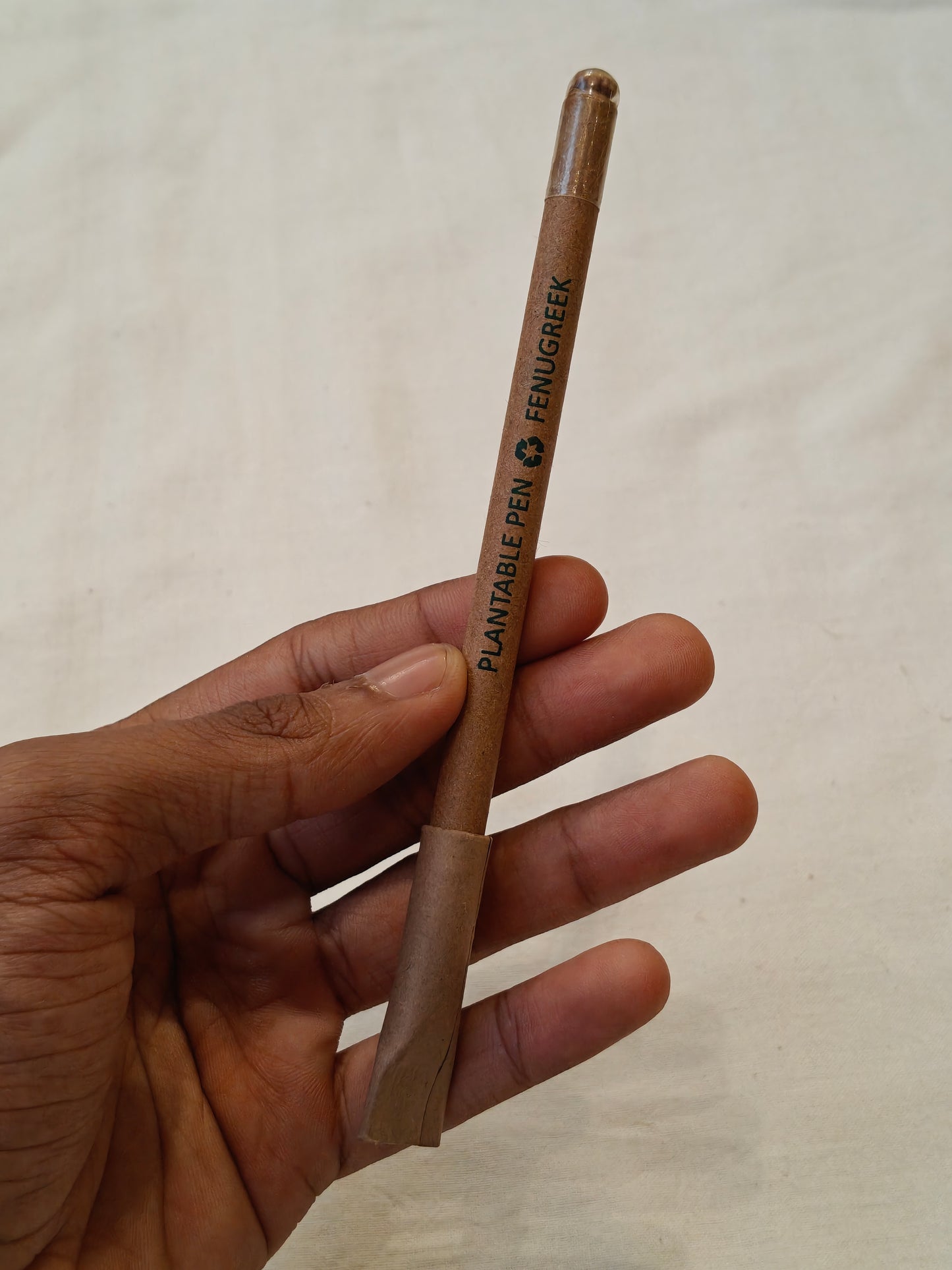 Handcrafted plantable pen with seeds at the bottom